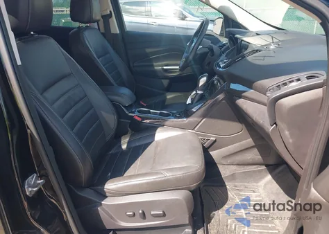 2016 Ford Escape Titanium z USA, uszkodzony, nr VIN 1FMCU9J90GUA43187